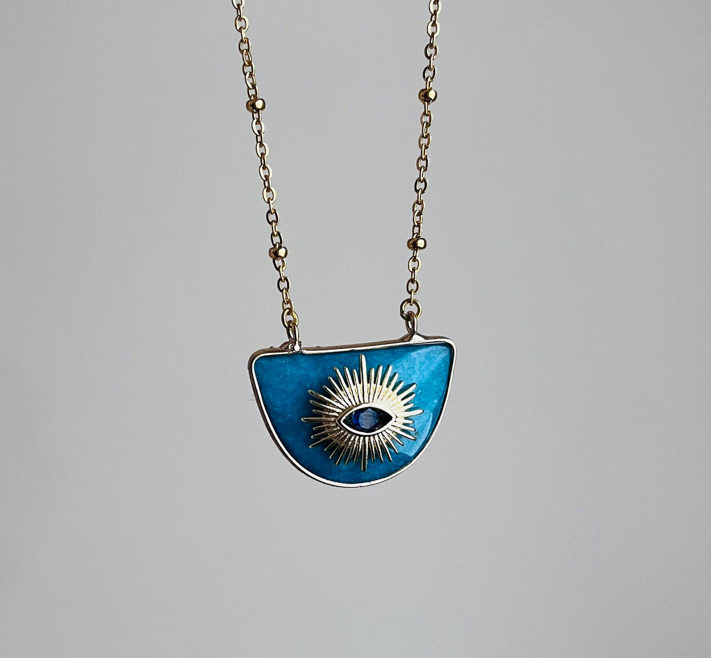 Collier grigri Jade bleu
