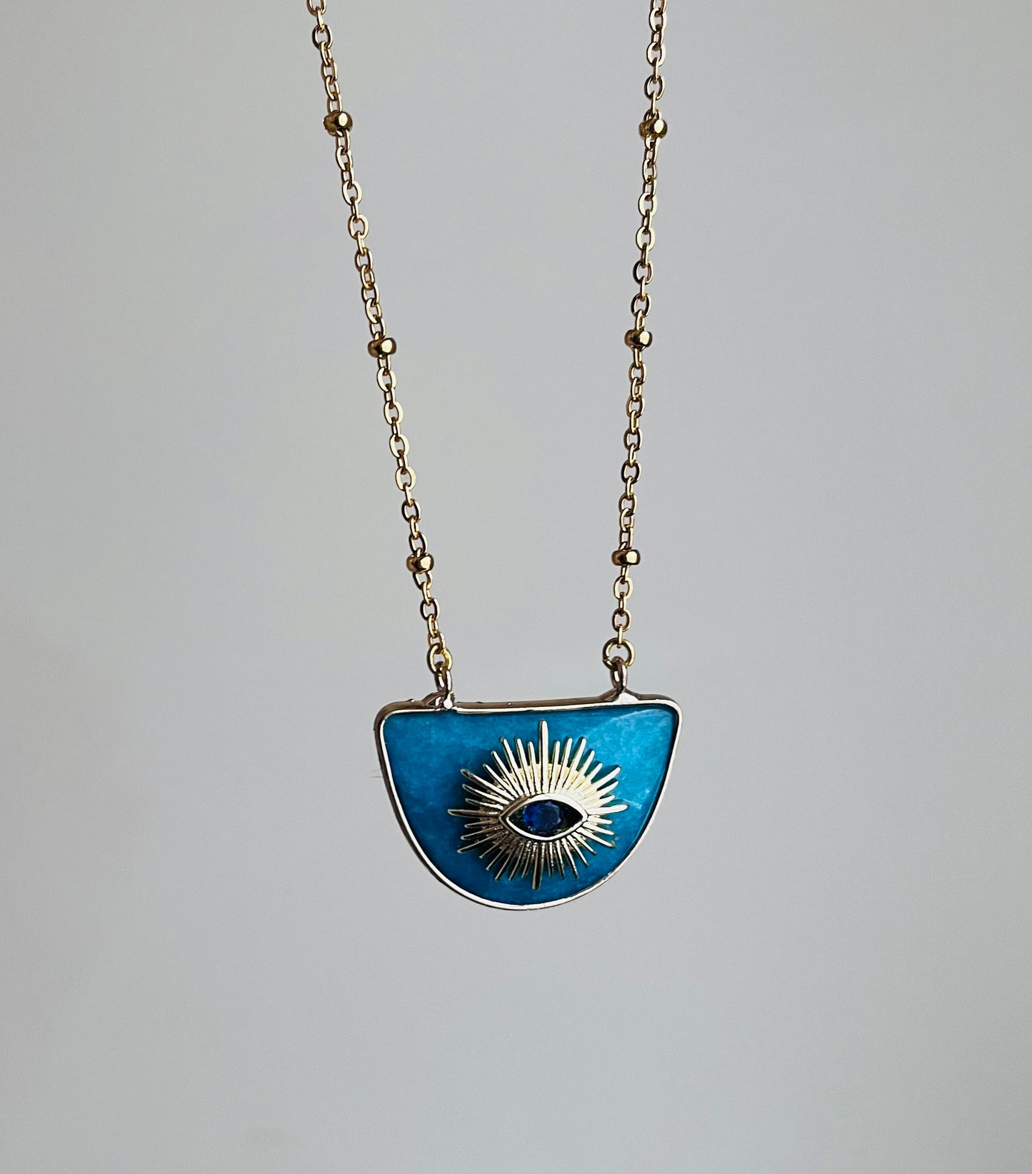 Collier grigri Jade bleu